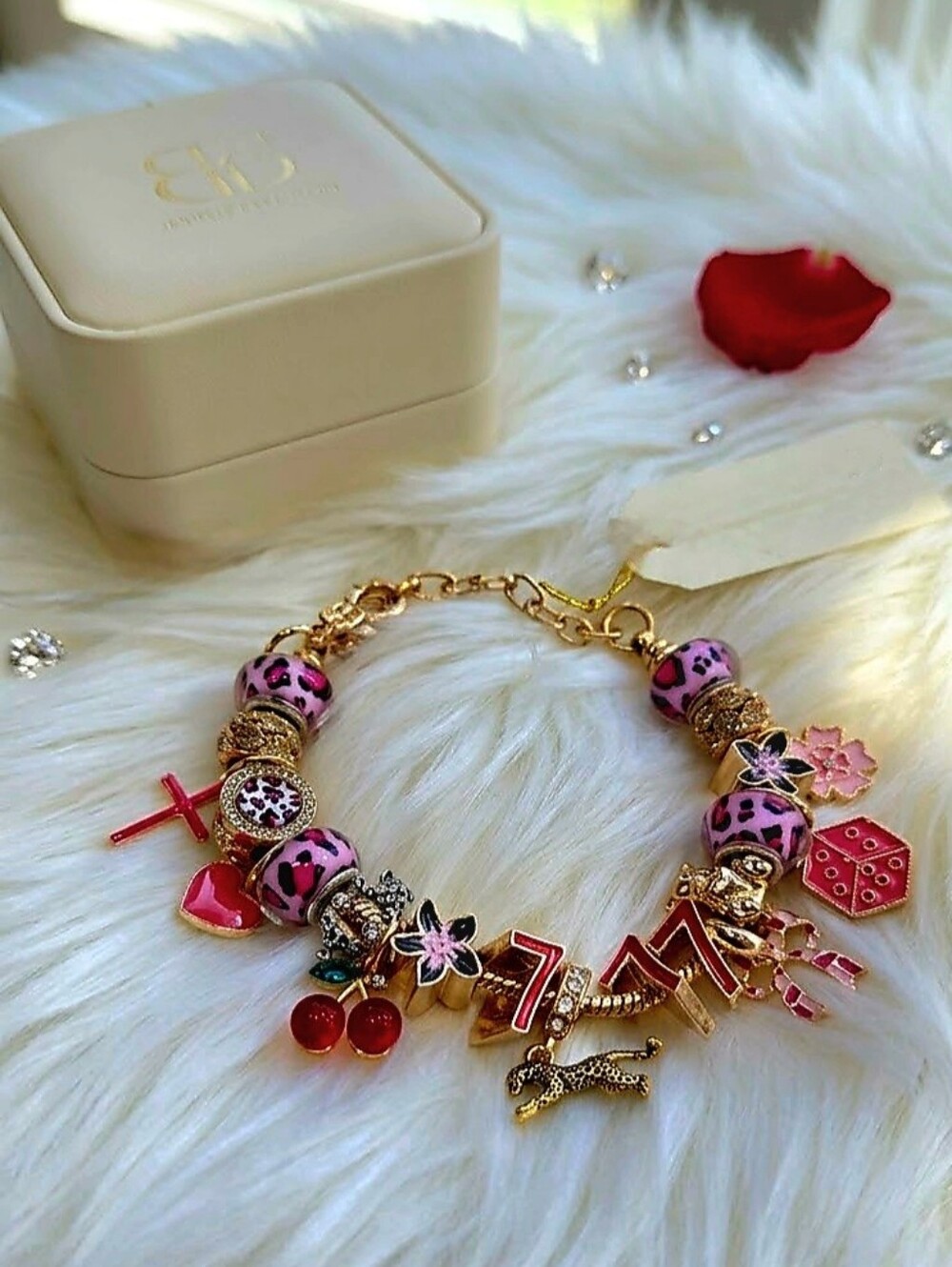Gold Charm Bracelet with Pink Leopard Beads